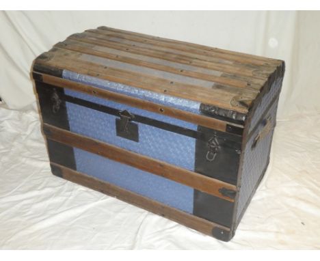 A 19th century domed travelling trunk with internal tray and fitments
