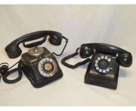 An old painted metal and composition Continental telephone with central bell and one other vintage black telephone (2)