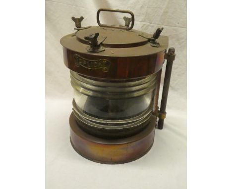 A brass mounted copper semi-circular ship's "toplight" lantern with electric light fitment 13" high