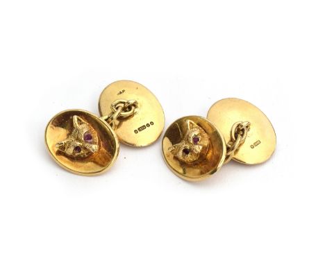 A pair of 9ct gold fox mask cufflinks, each set with ruby eyes, approx. 18.4g 