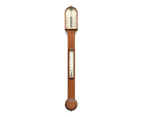 A Negretti &amp; Zambra oak cased aneroid stick barometer, with thermometer and vernier slide adjustor, 94cm high 