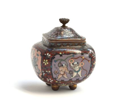 A Japanese Meiji era cloisonne enamel squat urn, the panels depicting butterflies and dancers, on four feet, 9.5cm high 