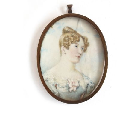 An early 19th century portrait miniature on ivory of a lady in Regency dress, in a gilt metal frame, 9.5x7cm 