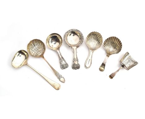 A King's Pattern Victorian silver caddy spoon by George Unite; together with three others, two with scalloped bowls; a shovel