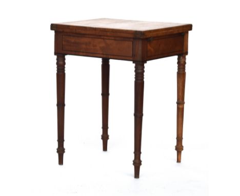 A Regency mahogany and ebony strung occasional games table, c.1830, fold out top, on ring turned tapering legs, 53cm wide, 46