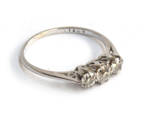 A platinum and diamond trilogy ring, size K, approx. 2.1g 