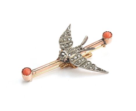 A Victorian swallow bar brooch, the white metal swallow set with old cut diamonds and ruby eyes, the bar brooch set with cora