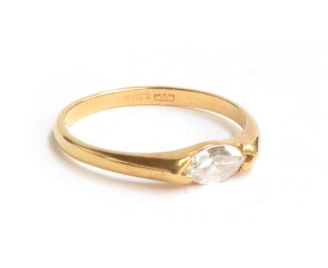 An 18ct gold ring set with a marquise cut diamond, the diamond approx. 7mm long, size K 1/2, approx. 1.7g 