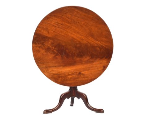 A Regency mahogany tripod table, the single piece circular tilt-top on a wrythen base and cabriole legs with pointed feet, 92