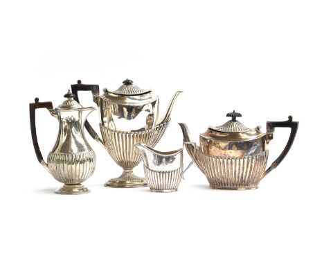 A Victorian three piece silver tea service by James Dixon &amp; Sons Ltd, Sheffield 1892, half fluted, the teapot and coffee 