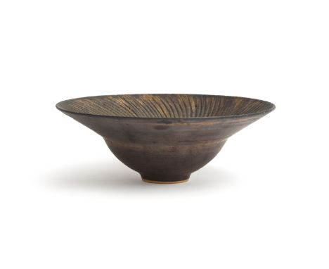 Colin Thorburn (20th century British- student of Lucie Rie), a studio pottery bowl, blue with a ridged coppered rim, marked t