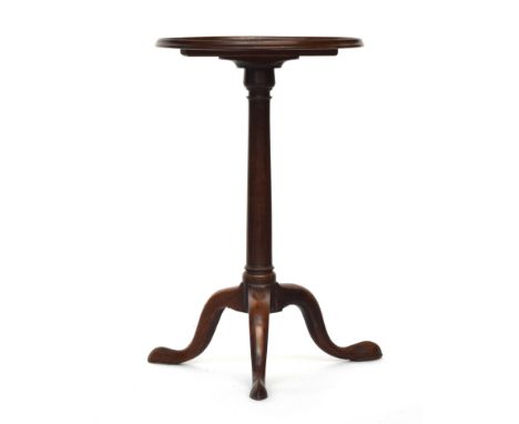 A Regency mahogany tripod table, the circular dished top on gun barrel column and cabriole legs with pointed pad feet, 45cm d