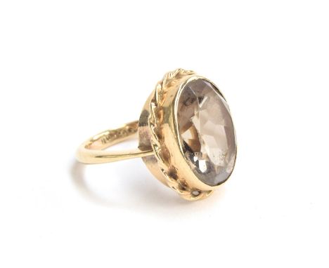 A 9ct gold ring set with a large smoky quartz, size L 1/2, approx. 5.6g 