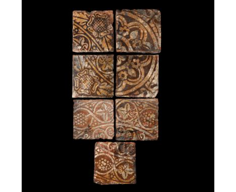 Malvern School, c.1480-1515 AD. A panel of seven rectangular glazed ceramic floor tiles with tessellated low-relief design of