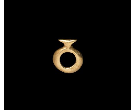 5th millennium BC or later. A gold Neolithic-style oval-shaped idol pendant with suspension loop.  2.7 grams, 15mm (1/2"). Pr