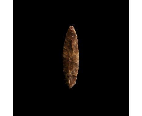 Neolithic, 8th-5th millennium BC. A knapped leaf-shaped spearhead; '10' pencilled to one face.  28.5 grams, 10.7cm (4 1/4"). 