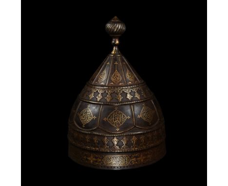 Late 19th-early 20th century AD. An Ottoman or Turkish ceremonial or parade iron helmet of conical form, with ribbed bulbous 