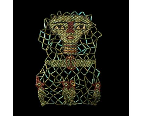 Ptolemaic Period, 332-30 BC. A restrung netted beadwork panel of ring-shaped and tubular glazed composition mummy beads in bl