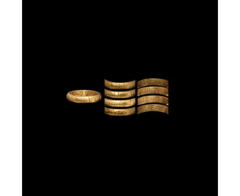 Early-mid 16th century AD. A substantial gold posy ring with heavy D-section hoop, inscribed in black letter script around th