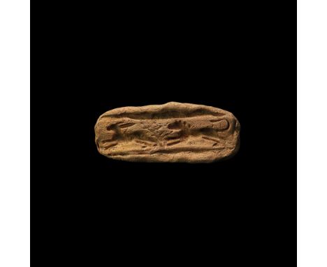 1st-2nd century AD. A rectangular ceramic mould with scene of a hound chasing a hare, within a simple border.  155 grams, 14c