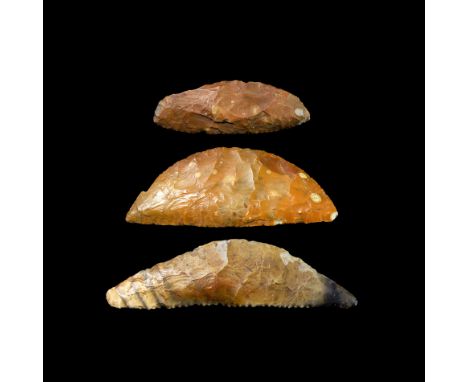 Neolithic, 6th-3rd millennium BC. A mixed group of knapped bifacial flint sickle knives; two with a straight edge and a curve