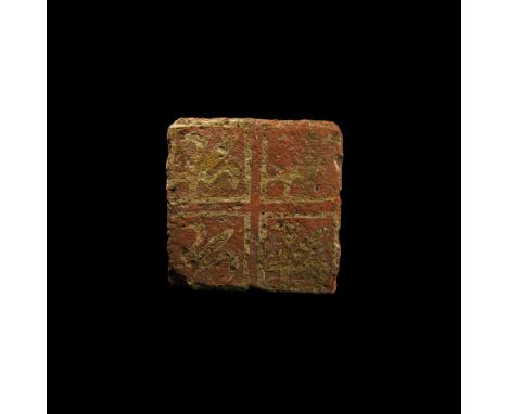 14th-15th century AD. A glazed ceramic floor tile with low-relief voided cross motif and a fleur-de-lys in each quadrant.  74