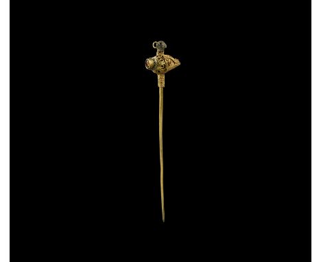 10th-12th century AD. A gold dress pin with braided filigree sleeve to the upper shank, filigree openwork piriform body with 