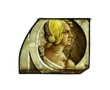 Northern France, c.1520-1530 AD. A large stained glass window insert quarry section showing a bust of a woman in profile, her