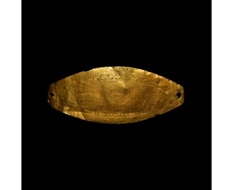 1st-3rd century AD. A Romano-Thracian gold funerary mouthpiece, of elliptical form with attachment holes at either end, decor