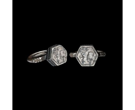 14th-15th century AD. A silver ring with D-section hoop, the shoulder area emphasised by a tongue-shaped ornament; an octagon