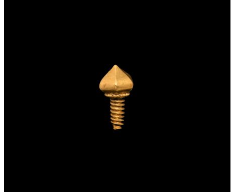 4th century AD. A hollow-formed gold hexagonal-section knop from a crossbow brooch with beaded collar and 'screw thread'. Cf.