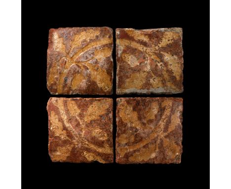 14th-15th century AD. A set of four glazed ceramic floor tiles each with a low-relief oak leaf motif placed diagonally.  2.7 