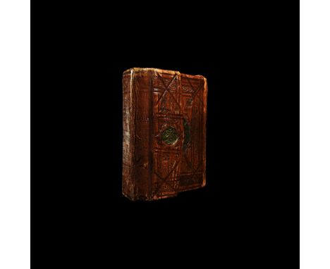 19th century AD. A portable leather-bound prayer book of circa 300 folios bearing ten lines of cursive maghribi script per pa