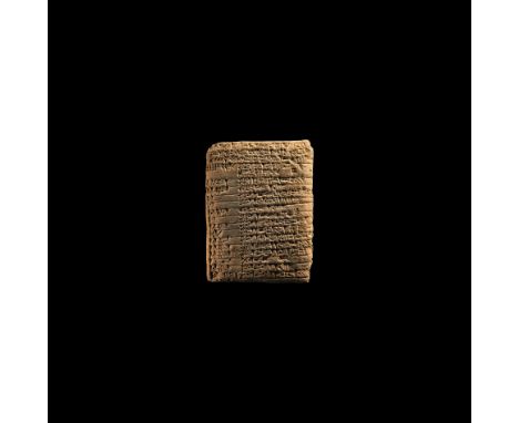19th-17th century BC. A ceramic pillow-shaped tablet with impressed cuneiform inscription to the broad faces. 220 grams, 91mm