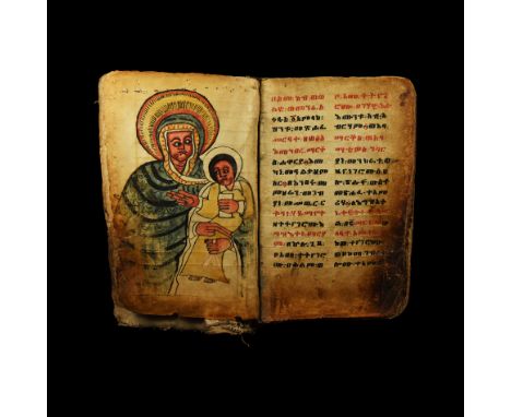 c.1750-1800 AD. A vellum manuscript bound between leather-covered wood boards with later fabric covering, the recto and verso