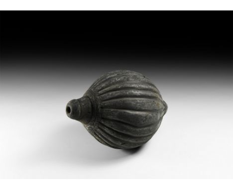 9th-11th century AD. A substantial hollow ceramic vessel, biconical in shape, intended to be filled with explosive liquid and
