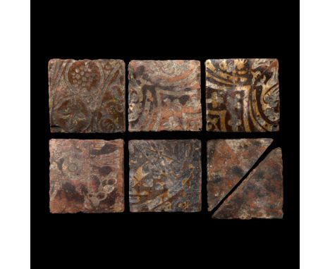 Malvern School, 15th century AD. A group of seven rectangular and triangular glazed ceramic floor tiles each with a low-relie