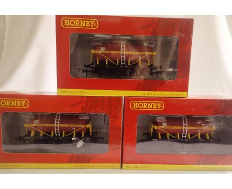 Three Hornby R6454 six wheel tanker, Satlink livery, near mint, slight storage wear to boxes. P&amp;P Group 1 (£14+VAT for th