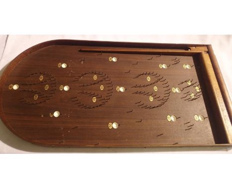 Vintage wooden Bagatelle game, complete with metal balls, approximately 70 x 35 cm. P&amp;P Group 1 (£14+VAT for the first lo