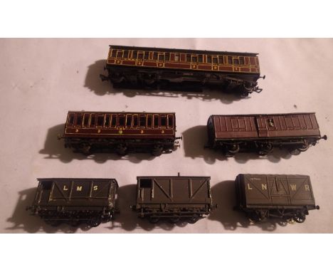 Six OO scale kit built wagons, metal and plastic mostly built and finished to a good standard. P&amp;P Group 1 (£14+VAT for t