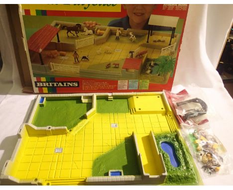 Britians 4713 farm play base in excellent condition, accessories in sealed bags, box has wear. P&amp;P Group 1 (£14+VAT for t