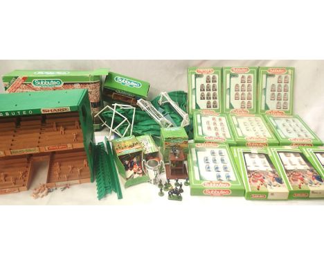 Quantity of Subbuteo items, including Grandstand, Tv stand, coals, mats etc. Plus ten boxed teams; Scotland, Liverpool 2nd, I