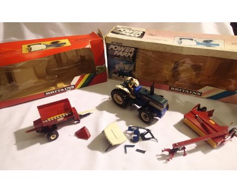 Britains power farm Ford tractor with Vari spreader and harrow. Damage to tractor canopy and spreader, boxes poor. P&amp;P Gr