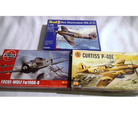 Three 1/72 scale plastic kits: Revell Sea Hurricane, Airfix Kittyhawk and FW 190, contents unchecked. P&amp;P Group 1 (£14+VA