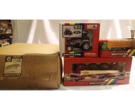 Britains tractor and implements comprising of 2120 Ford tractor, 9534 round bale wagon, 9555 trailer. All in excellent to nea