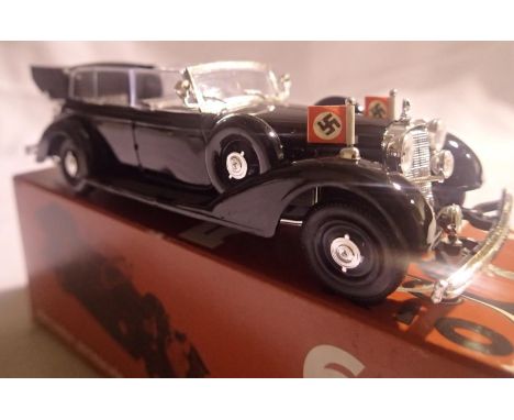 Rio-64 1942 Hitlers Mercedes in very good to excellent condition and one front spot lamp detached present, box with wear. P&a