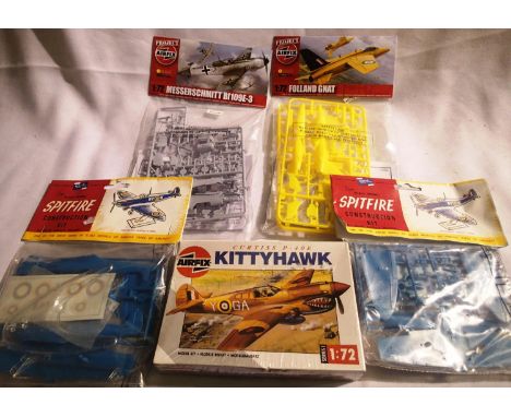 Five Airfix 1/72 scale aircraft kits: Spitfire x2, Kittyhawk, ME 109 and Folland Gnat, contents unchecked. P&amp;P Group 1 (£