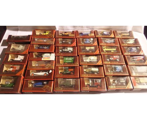 Matchbox Yesteryear vehicles x36, mostly in excellent condition, boxes with wear/dusty. P&amp;P Group 2 (£18+VAT for the firs