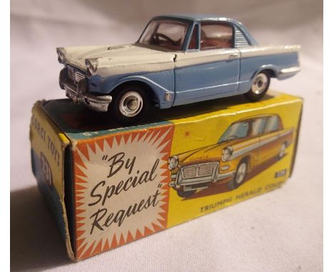 Corgi toys 231 Triumph Herald coupe, blue/white in excellent condition, box is good. P&amp;P Group 1 (£14+VAT for the first l