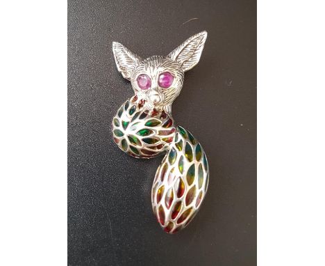 RUBY AND ENAMEL SILVER BUSH BABY BROOCHwith ruby eyes, the body and tail divided into colourful sections, approximately 5cm h